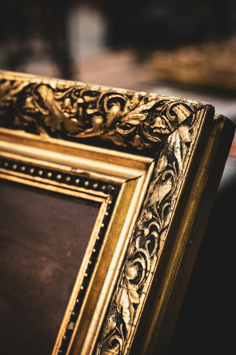 Ornate gilded frame detail — Prime Frame London workshop