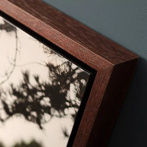 Dark walnut tray frame corner detail