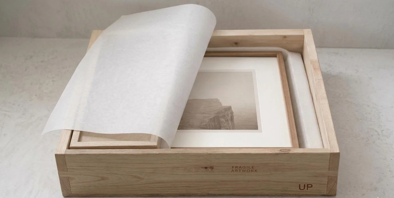 Framed artwork secured in custom wooden crate ready for delivery