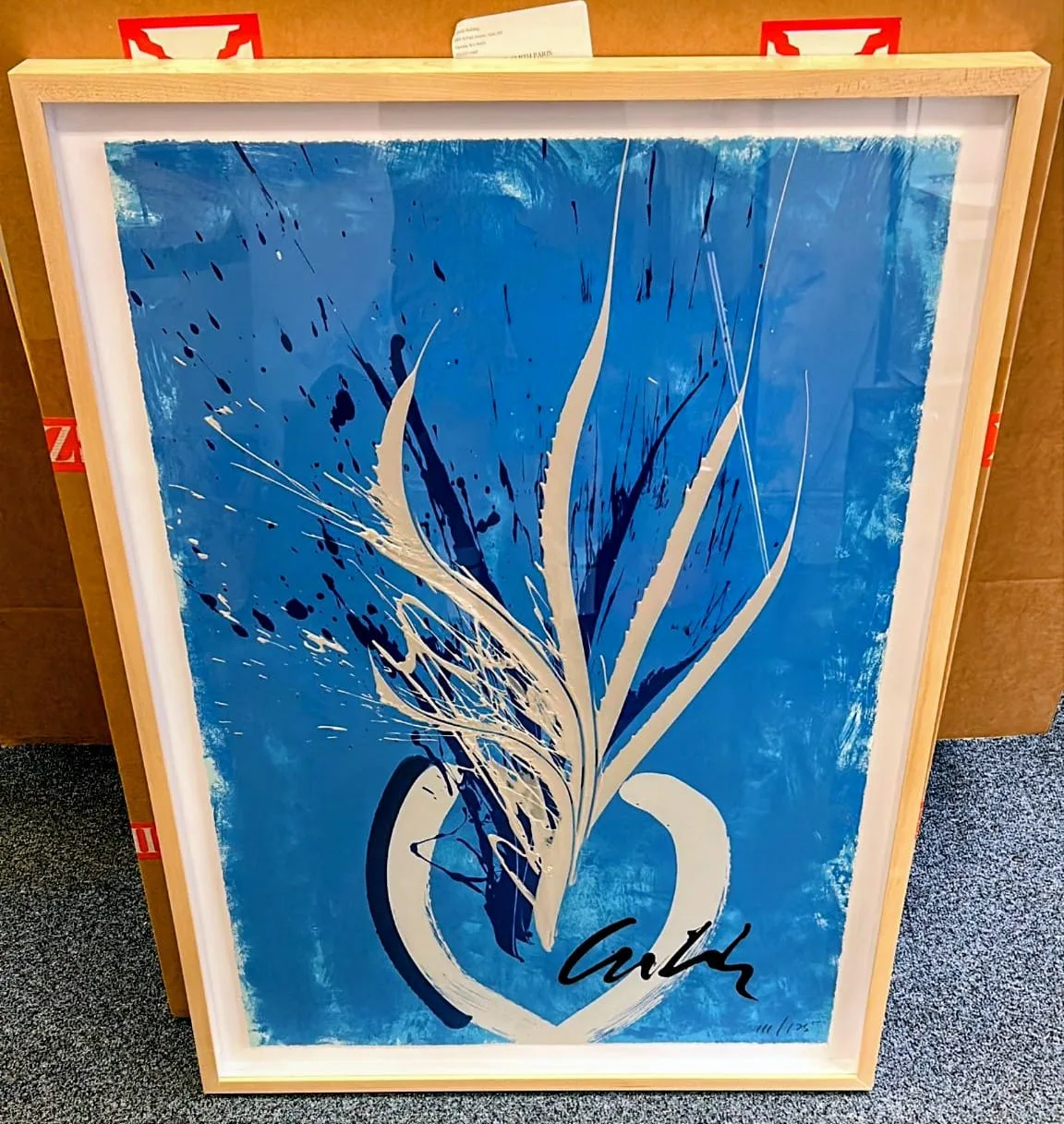 Natural wood frame with abstract print